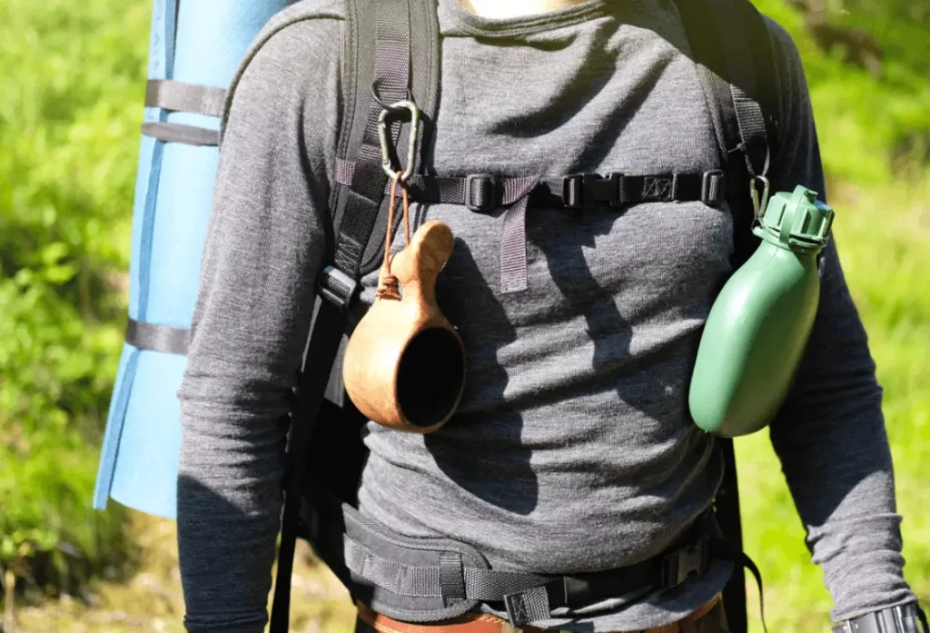 A kuksa dangling from a backpack.