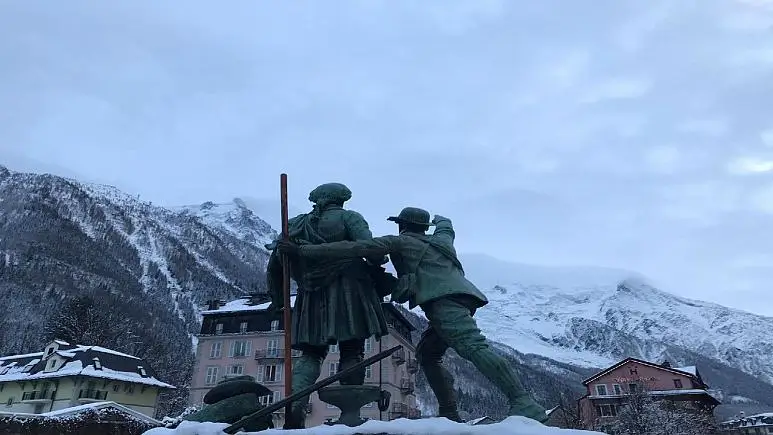 The statue of Jacques Balmat showing Horace Benedict de Sassure the route up to the summit of Mont Blanc.