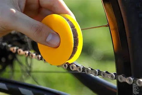 A photo showing chain maintenance for cycling.